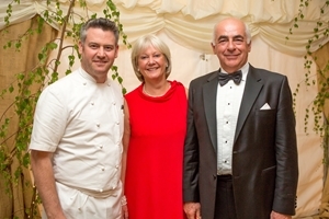 Renowned gourmet chef Colin McGurran (left) with hosts Julia and Chris Butterfield. Photocredit: Jason Glenn.