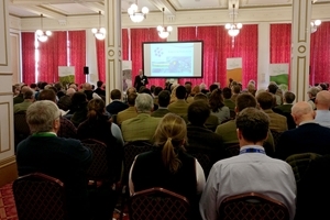 Adam Smith addressing the audience