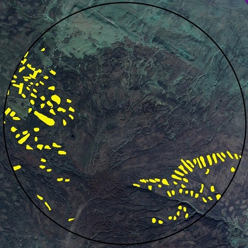 Aerial image of merlin territory with mapped burns in yellow