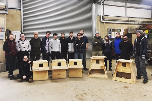 Sparsholt College students with their finished barn owl boxes Sparsholt College students with their finished barn owl boxes