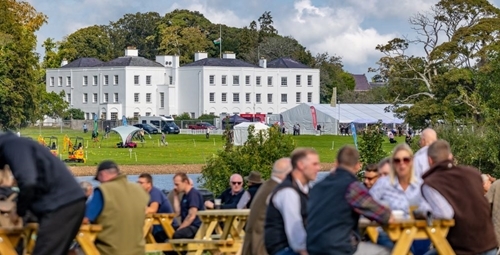 Visitors Resting Their Legs And Enjoying The Sunshine At The GWCT Welsh Game Fair At Vaynol Hall