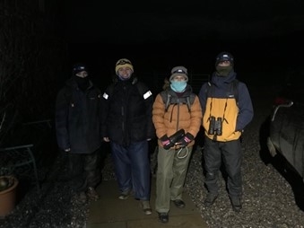 The four students getting ready to head out for an evening of counting rabbits using thermal binoculars