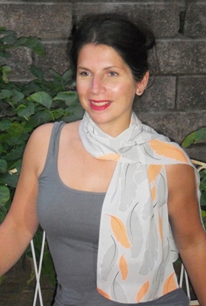 Katrina Candy wears the scarf she has designed exclusively for the Game & Wildlife Conservation Trust