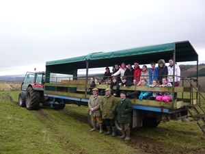 (l to r) Estate manager Brian Kaye, GWCT education assistant Alex Towns and gamekeeper Neil Gunn with the P7 pupils from St Madoes Primary School
