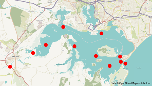Location of WR2W receivers in Poole Harbour. Red dots represent approximate detection range of the receivers.