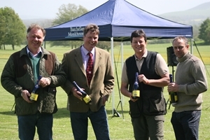 The 'Wivelsden Bandits' show off their prize for winning the clay shoot at the Glynde Estate, Sussex. (Left to right) David Fenner, team captain Nick Harvey, Rob Fry and Sean Smith