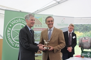 Winner Ashley Cooper with the Duke of Westminster and Jake Fiennes, farm manager at Raveningham, where the Silver Lapwing Award ceremony took place